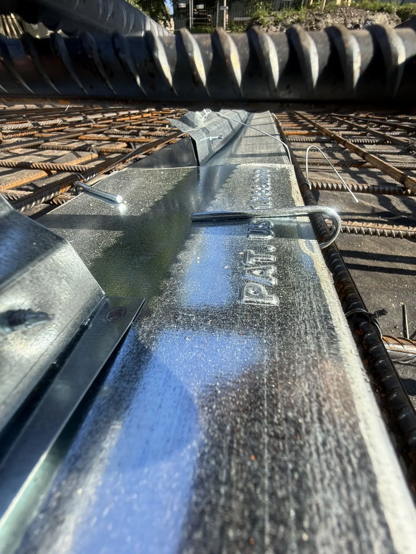 WPM Crack Inducing Waterstop profile installed in the floor slab construction before concrete casting. The picture also shows that our WPM Crack Inducing Waterstop profile is patent-protected.