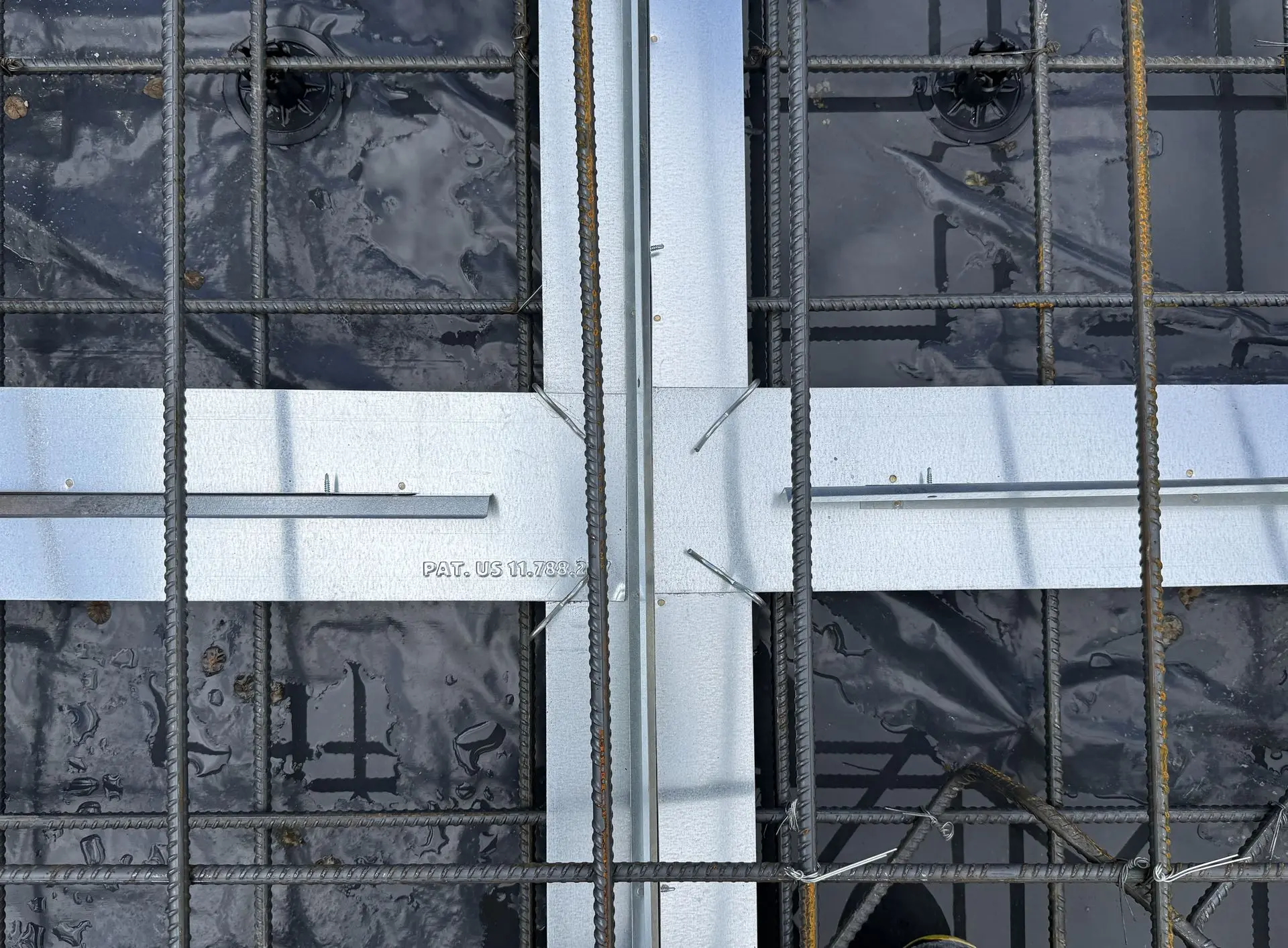 Patented Primostar® Crack Control System in the floor slab before the concrete is cast.