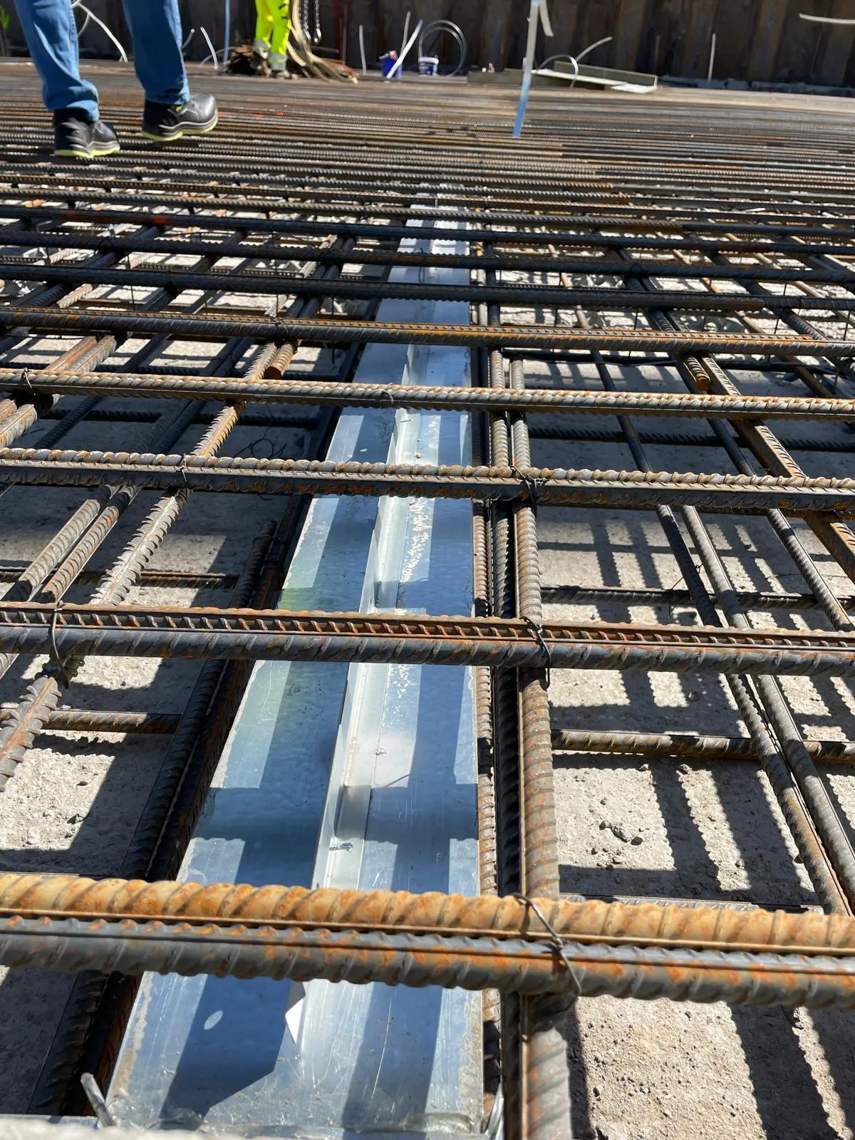 Patented Primostar® CRACK CONTROL SYSTEM (WPM® Crack Inducing Waterstop) in floor construction slab before concrete pouring (cast). Object Latvia, Riga.